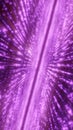 Radiant purple particle beams exploding outward, creating a vibrant energetic light spread Royalty Free Stock Photo