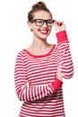 Radiant in red and white. Studio portrait of an attractive young woman in glasses isolated on white. Royalty Free Stock Photo