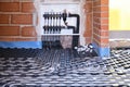 Radiant underfloor heating hydronic manifold with flexible tubing. Royalty Free Stock Photo