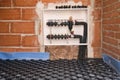 Radiant underfloor heating hydronic manifold.