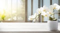 Radiant White Orchid Flower Decoration: A Serene Spa Ambiance with Sunlit Elegance. Royalty Free Stock Photo