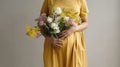 Radiant Woman in a Yellow Dress Caressing her Baby Belly, Graced by a Gentle Floral Bouquet. Generative AI