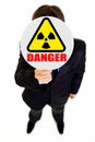 Radiation danger! Businessman with radiation sign