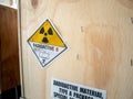 Radiation label beside the transport wooden box