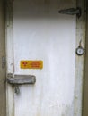 Radiation warning on a locked door