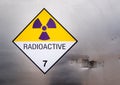 Radiation warning sign on the Dangerous goods transport label Class 7 at the container of transport truck Royalty Free Stock Photo