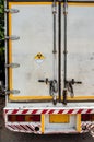 Radiation warning sign on the Dangerous goods transport label Class 7 at the container of transport truck Royalty Free Stock Photo