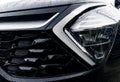 Radiator grille pattern. Car radiator grill close up with water drops. Chrome grill of big powerful car engine. Car exterior