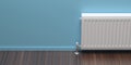 Radiator, wood floor, blue wall background. 3d illustration