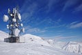 Radio aerial antenna mast with a lot of satellite dishes, parabolic reflector or dish antennas