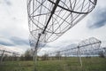 Radio astronomy observatory radio telescope construction in the fields in early spring in cloudy weather