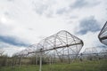 Radio astronomy observatory radio telescope construction in the fields in early spring in cloudy weather