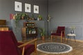 Radio on cabinet in vintage grey living room interior with rug a