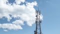 Radio, communication and cell towers on blue sky with clouds background. Satellite dish telecom network at sunset communication Royalty Free Stock Photo