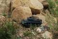 Radio control army tank on rock