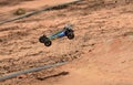 Radio controlled buggy car model in race