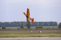 Radio controlled plane flying in the sky performing aerobatics Royalty Free Stock Photo