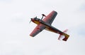 Radio controlled plane flying in the sky performing aerobatics Royalty Free Stock Photo