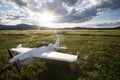 Radio controlled toy plane in the grass Royalty Free Stock Photo