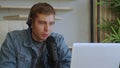 Radio host concept - Portrait handsome man sitting in front of microphone Royalty Free Stock Photo