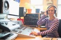 Radio host using sound mixer Royalty Free Stock Photo