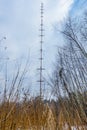 Radio tower in the winter forest. Russia. Royalty Free Stock Photo