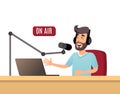 The radio presenter is talking on the air. A young radio DJ in headphones is working on a radio station. Broadcasts flat design Royalty Free Stock Photo