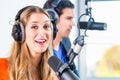 Radio presenters in radio station on air Royalty Free Stock Photo