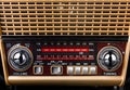 Radio receiver in retro style with radio dial and silver buttons Royalty Free Stock Photo