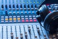 Radio station: Headphones on a mixer desk in an professional sound recording studio