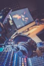 Radio station: Headphones on a mixer desk in an professional sound recording studio Royalty Free Stock Photo