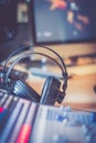 Radio station: Headphones on a mixer desk in an professional sound recording studio Royalty Free Stock Photo