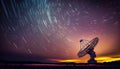 Radio telescope antenna radio receiver on beautiful night sky with star trails copy space Royalty Free Stock Photo