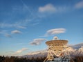 Radio telescope on the background of a blue sky at sunrise Royalty Free Stock Photo