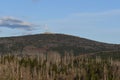 Radio tower and buildings on the Brocken mountain top under the blue sky Royalty Free Stock Photo