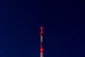 Radio tower on night starry sky background Royalty Free Stock Photo