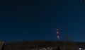 Radio tower on night starry sky Royalty Free Stock Photo