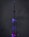 Radio tower, night, purple lights Royalty Free Stock Photo