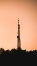 Radio tower on the top of the hill at sunset Royalty Free Stock Photo