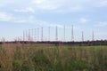 Radio towers in the field Royalty Free Stock Photo