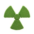A radioactive hazard symbol depicted with green grass isolated on a white background