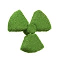 A radioactive hazard symbol depicted with green grass isolated on a white background