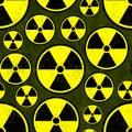 Radioactive nuclear symbol over green background with worn out effect