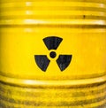 Radioactive sign. Yellow nuclear waste barrel.