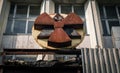 Radioactive symbol on the facade of the building in Chernobyl