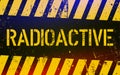 Radioactive warning sign. Nuclear power danger symbol with yellow and hazard black stripes. Vector Illustratio.