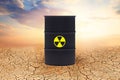 Radioactive waste barrel against sky clouds. Radioactive waste barrels. Environment protection and toxic nuclear pollution concept