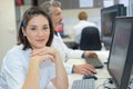 Radiographer posing in front computer