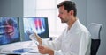 Radiologist dentist using x ray software