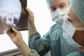 Radiologists Examining Xray Of Skull